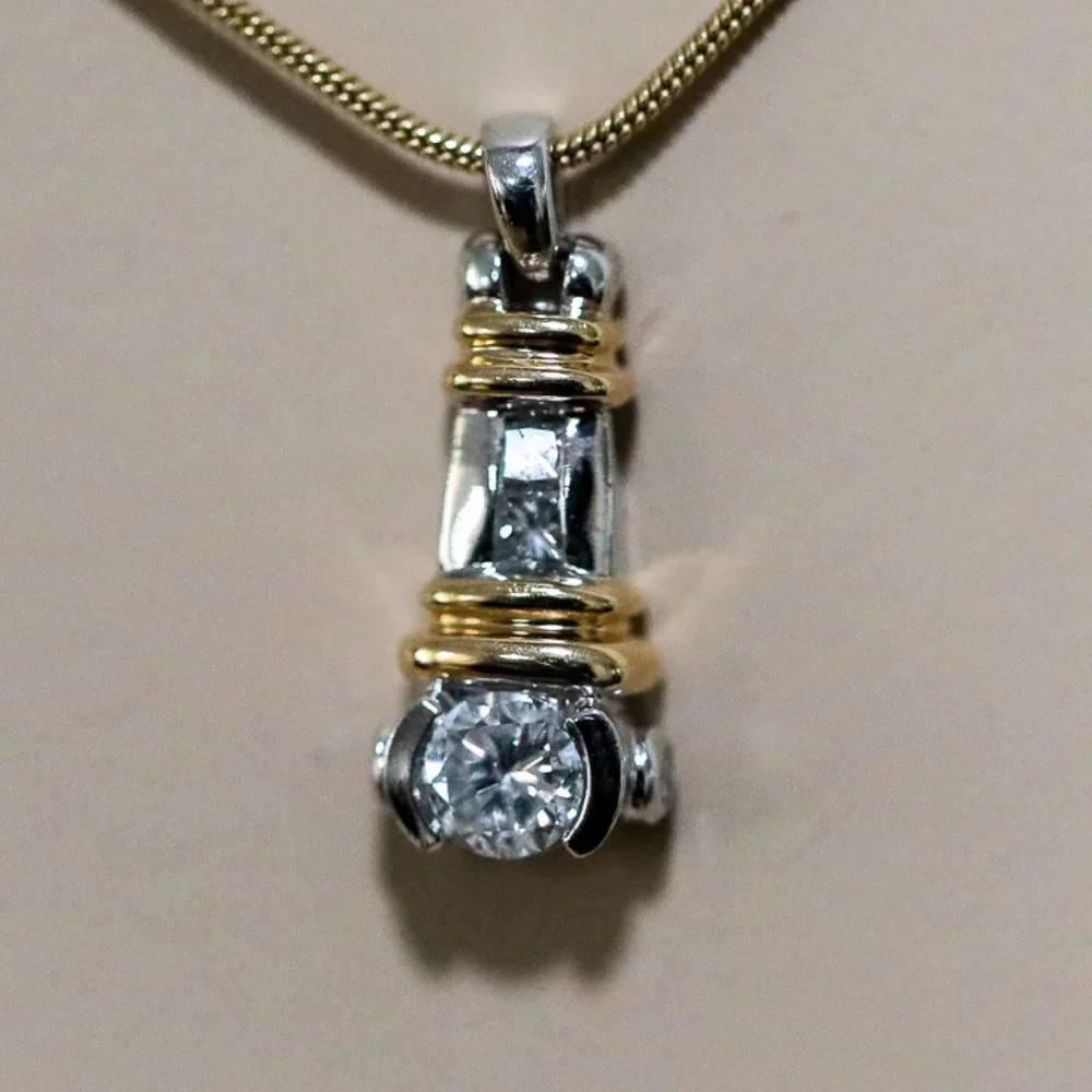 LADIES VINTAGE 14 KARAT WHITE & YELLOW GOLD BEZEL SET DIAMOND PENDANT